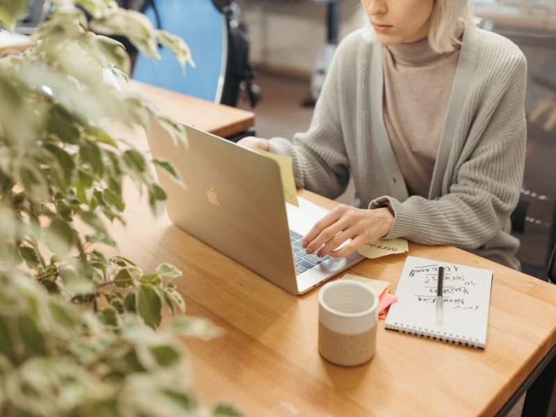 Woman working on email at a laptop