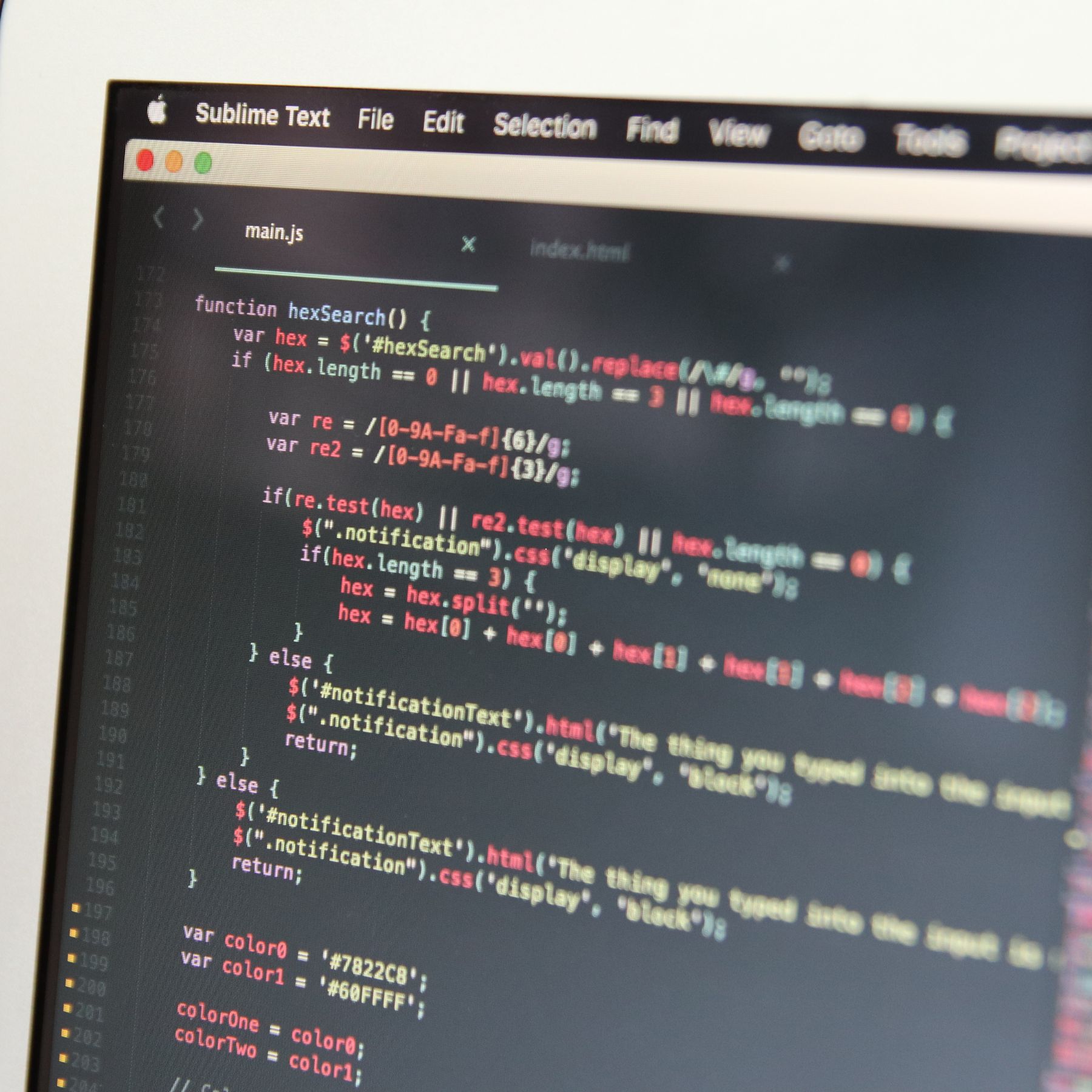 Computer screen displaying website code